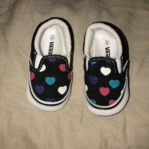 multi colored checkerboard slip on vans